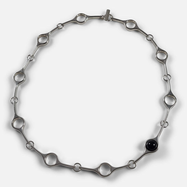 The Georg Jensen Sterling Silver & Onyx Sphere Necklace designed by Regitze Overgaard, viewed from above