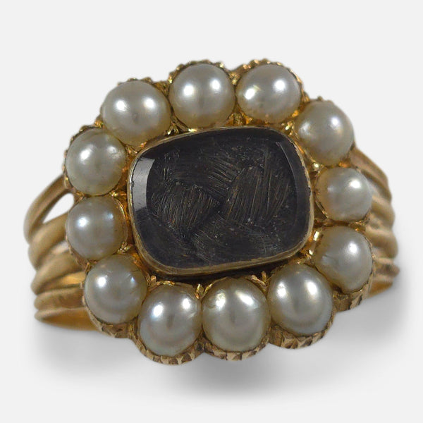 The George III 18ct Gold Pearl, and Hair Memorial Ring, viewed from above from a slight angle