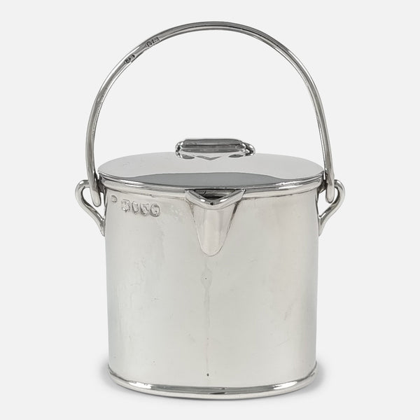 The Victorian Sterling Silver Novelty Cream-Pail by Joseph Braham, viewed from the front with swing handle raised