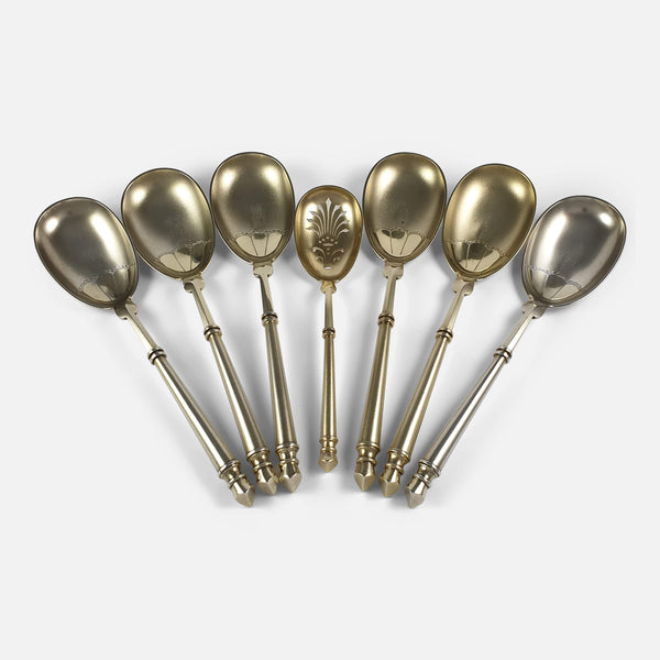 the sterling silver fruit serving spoons spread out in a fan shape