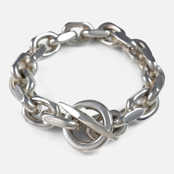the bracelet viewed from a slightly rasied position with toggle to forefront