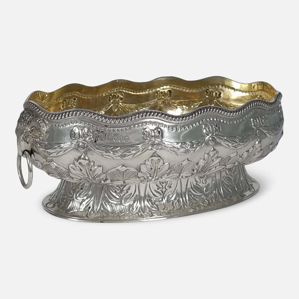 the bowl rotated slightly with one of the rams heads more to forefront and facing towards the left