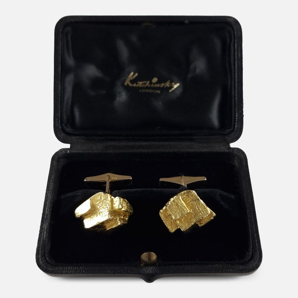 the cufflinks viewed in their case