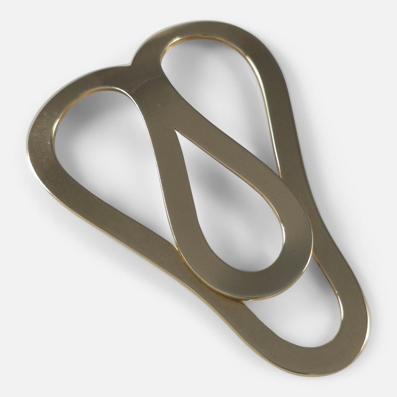 the money clip viewed diagonally facing towards the lower right hand corner