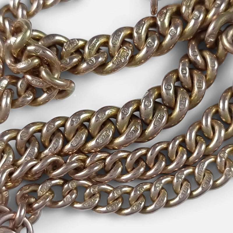 focused on the gold fineness marks to a number of the chain links