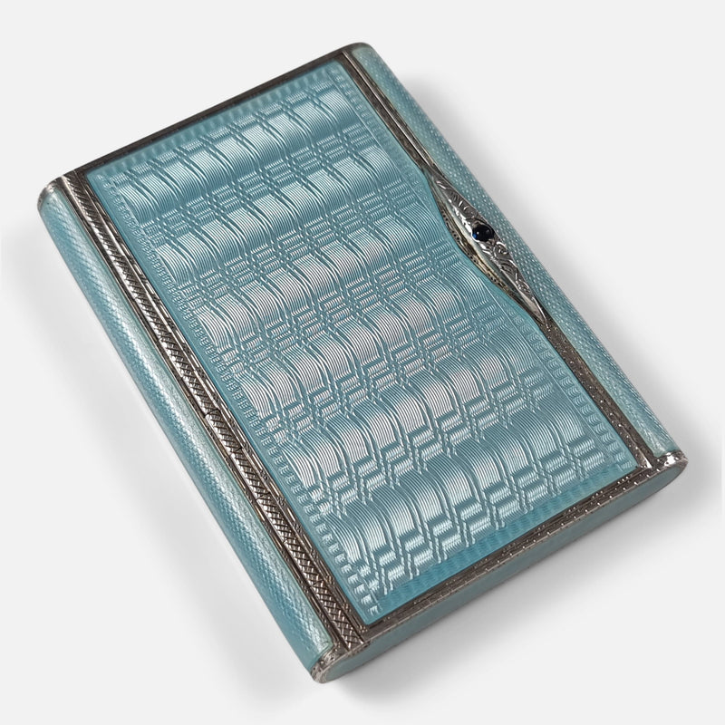 the case viewed from above at an angle with thumbpiece to the upper right side of the image