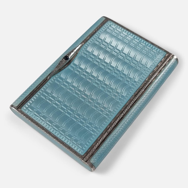 the case viewed from above at an angle with thumbpiece to the upper left side of the image