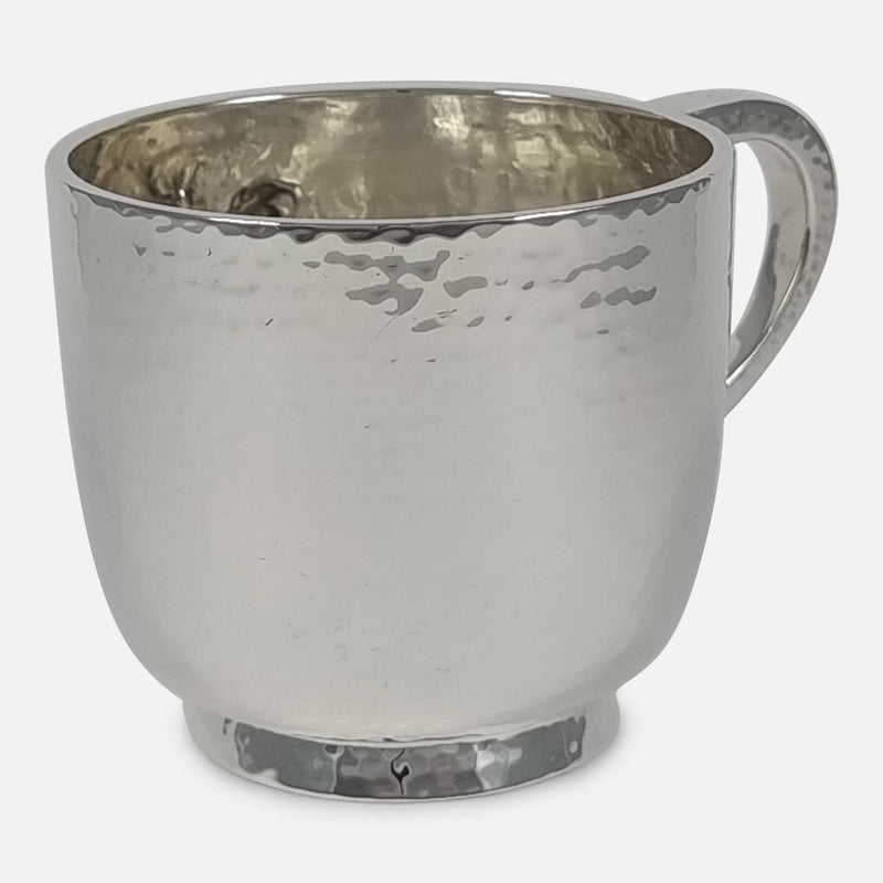 the mug rotated with handle to the right and slightly to the background