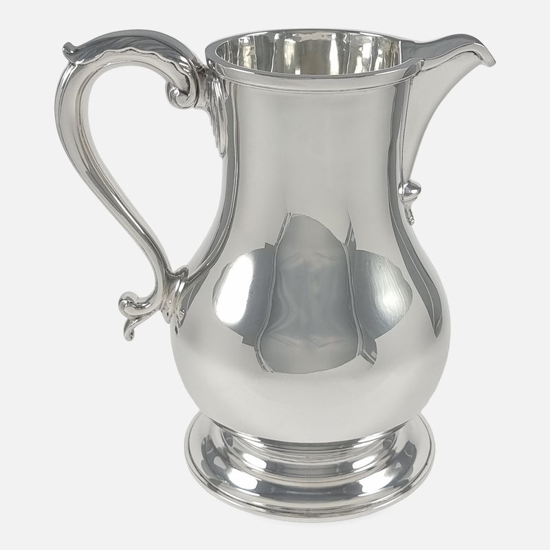 the jug viewed side on with spout facing to the right