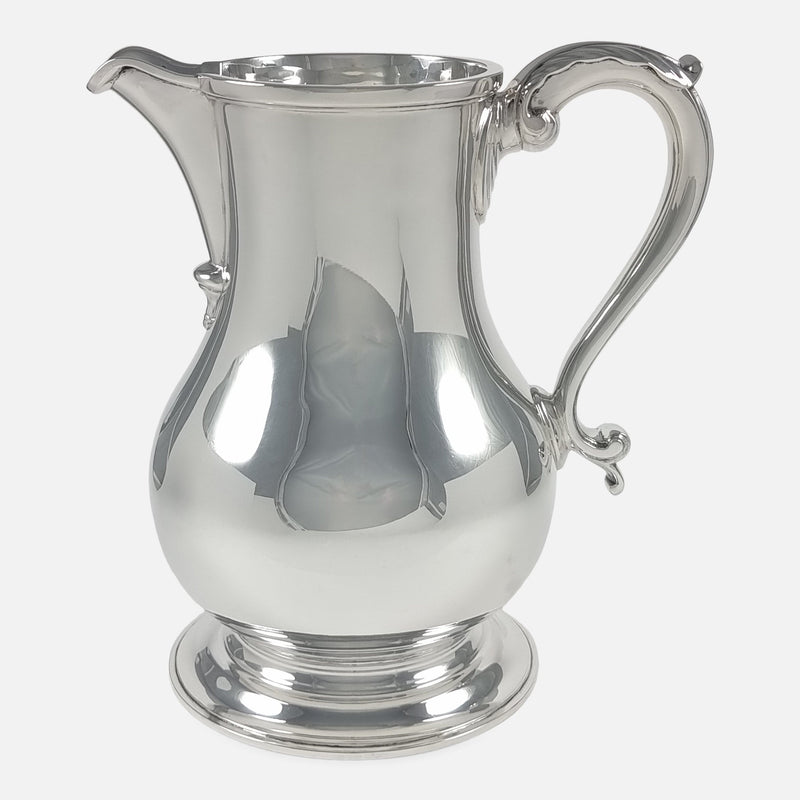 the jug side on with spout facing to the left side of the image