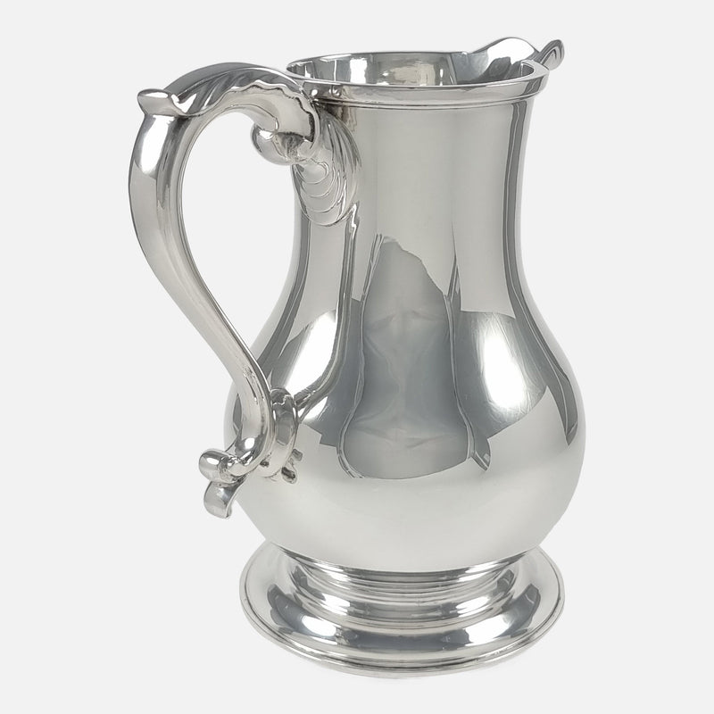 the jug rotated with spout backwards slightly towards the right