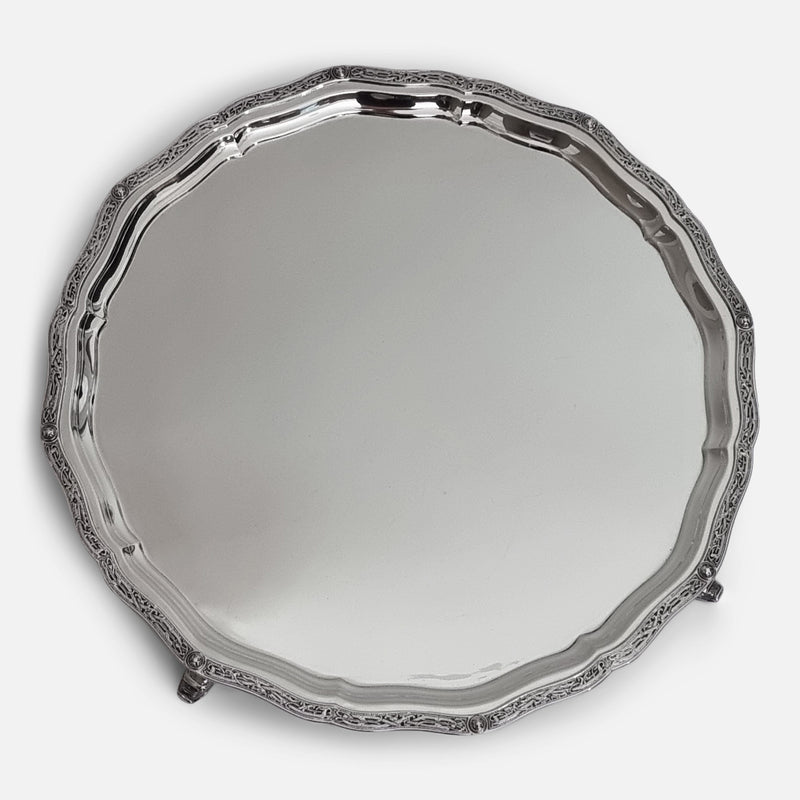 The Elizabeth II Sterling Silver 'Lindisfarne' Salver by Reid & Sons, viewed at a slight angle