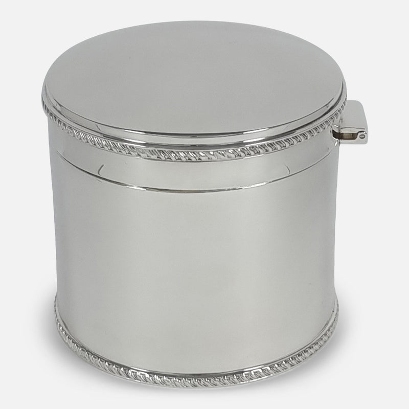 a side on view of the tea caddy with hinge facing towards the right side