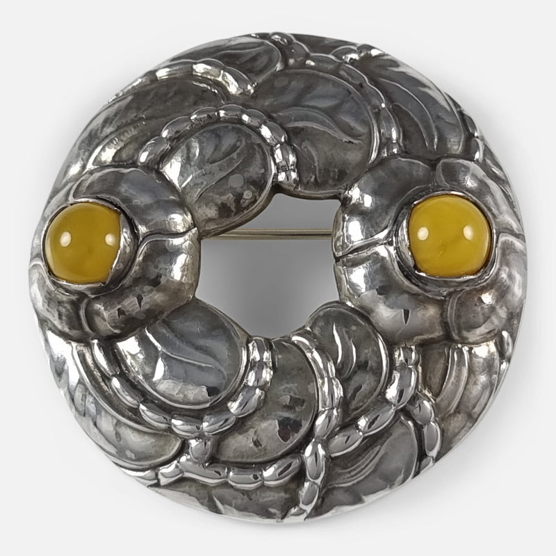 The Georg Jensen Sterling Silver Amber Anniversary Brooch #42, viewed from above