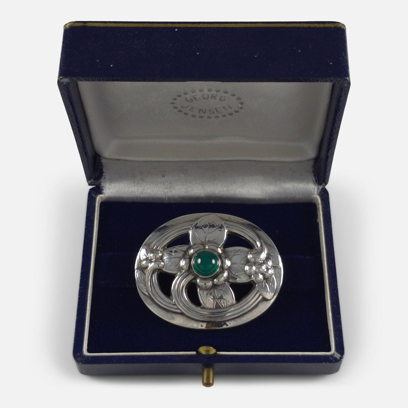 the brooch in its box