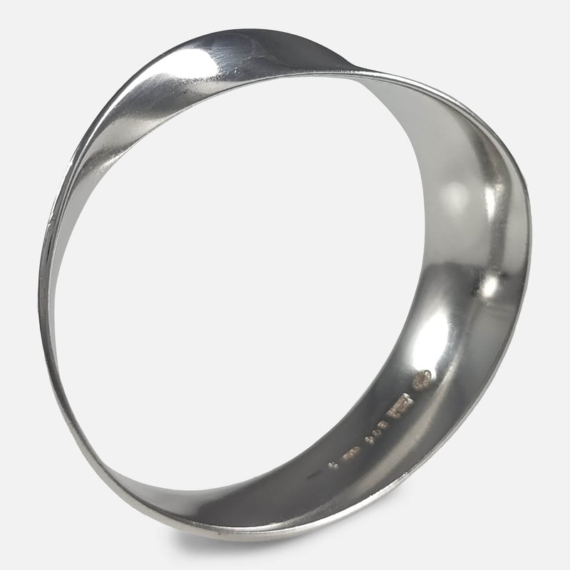 the bangle standing on side and viewed at a slight angle