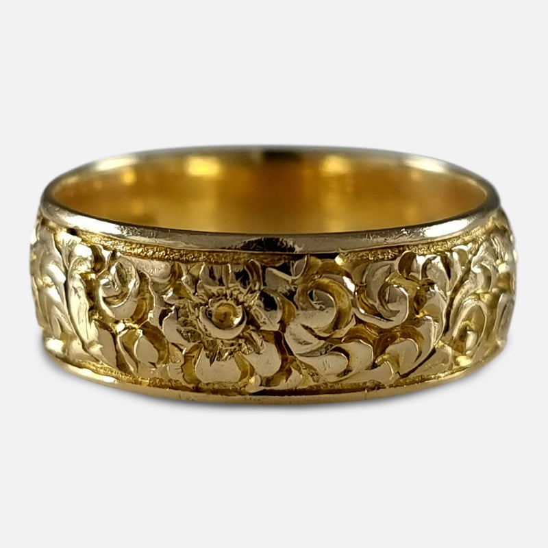 the ring with a section of the engraved decoration in focus