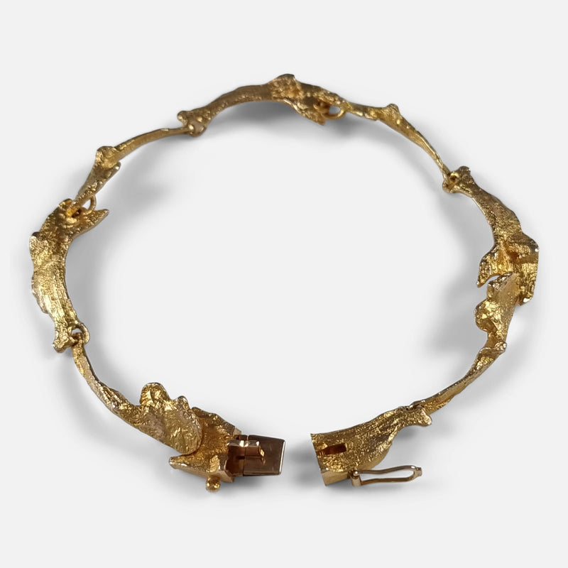 the bracelet viewed from above with clasp unfastened