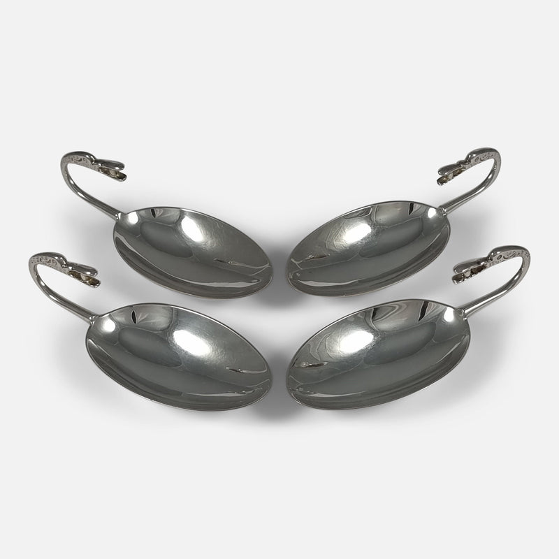spoons viewed from above with dishes angled slightly in towards each other
