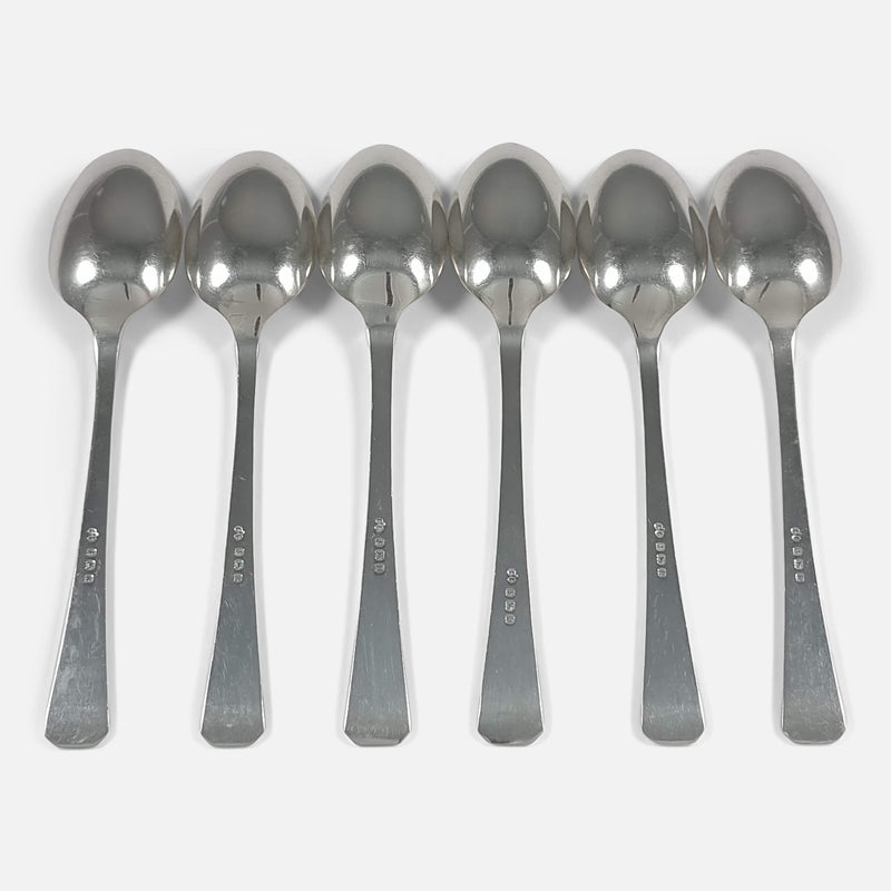 the spoons face down in a row