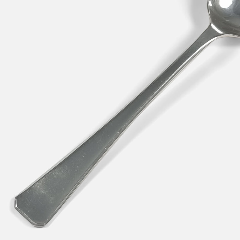 focused on the stem and handle to one of the spoons