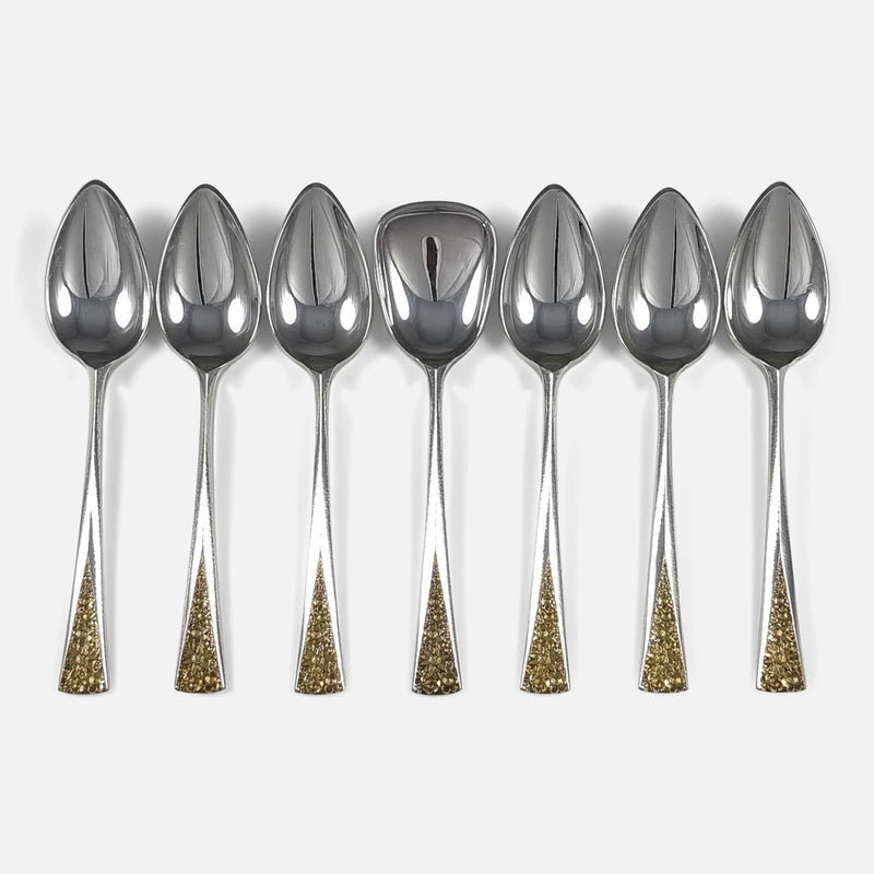 The Set of 6 Sterling Silver-Gilt Teaspoons and Shovel by Stuart Devlin, viewed from above