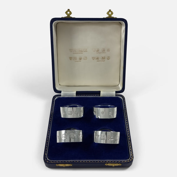 The Set of Four Sterling Silver Napkin Rings by Garrard & Co, in their original case