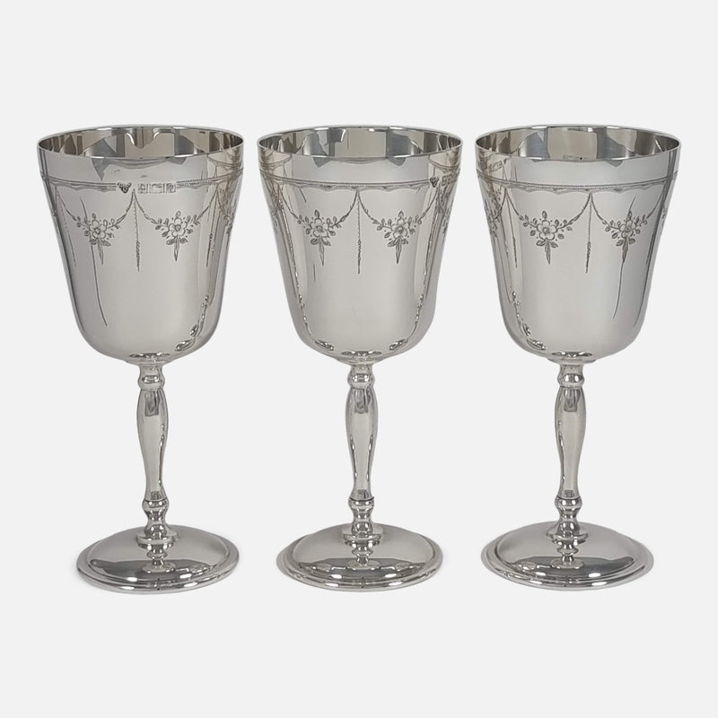 Focused close-up on the remaining three goblets, side by side, showcasing their intricate designs and elegance.