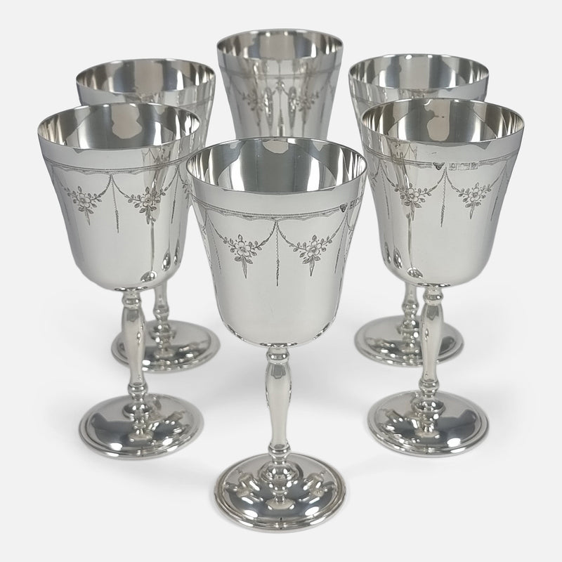 Elevated view of six goblets, showcasing their arrangement and design details from above.