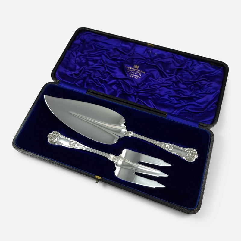 The Set of Sterling Silver Kings Pattern Fish Servers viewed in their case