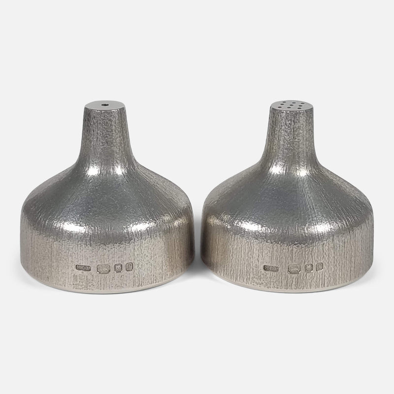 The Sterling Silver Salt & Pepper Set by House of Lawrian, viewed with hallmarks to the forefront