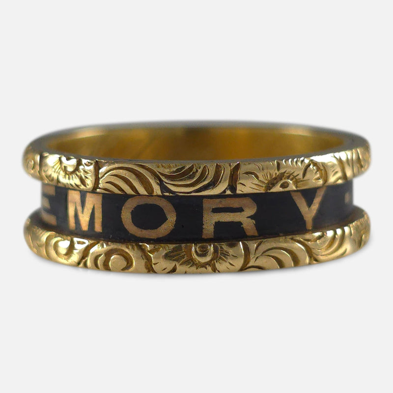 part of the inscription to the outside of the ring in focus