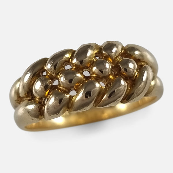 The Victorian 18ct Gold Keeper Ring, viewed from above at a slight angle