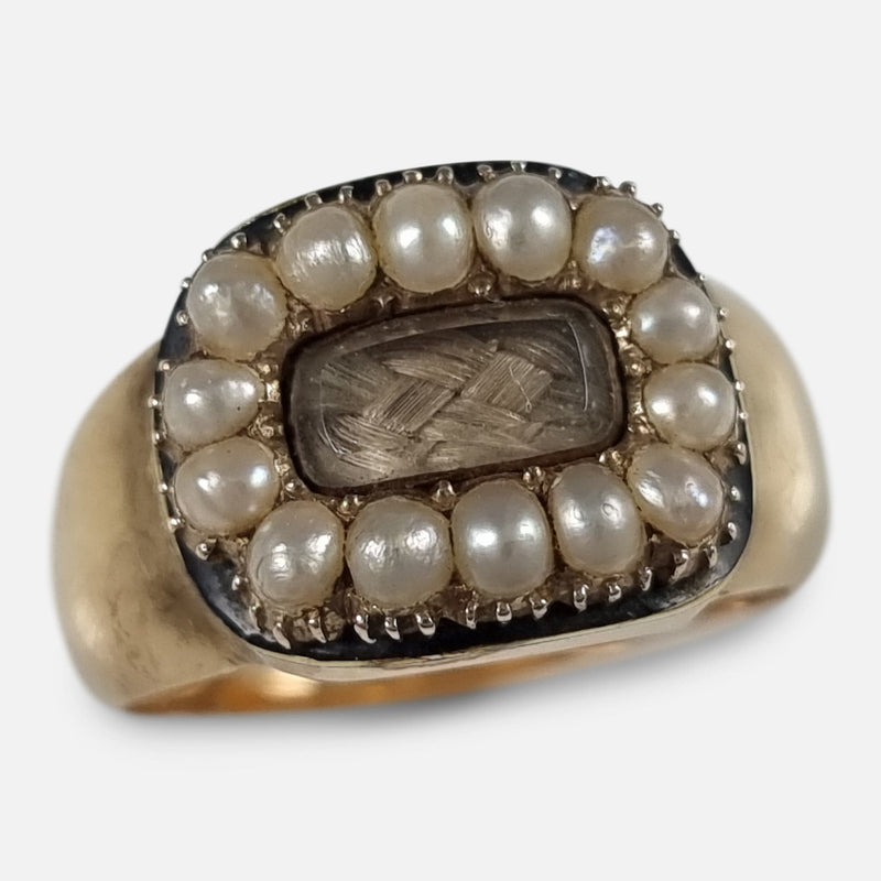 The Victorian 18ct Gold Pearl, Enamel, and Hair Mourning Ring, viewed from above at a slight angle
