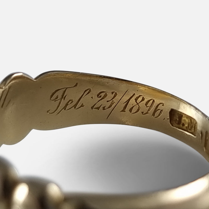 a view of the inscription to the inside of the ring