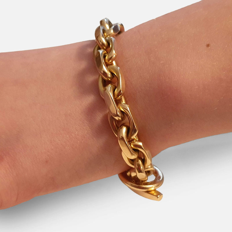 14ct gold chain link bracelet on a wrist