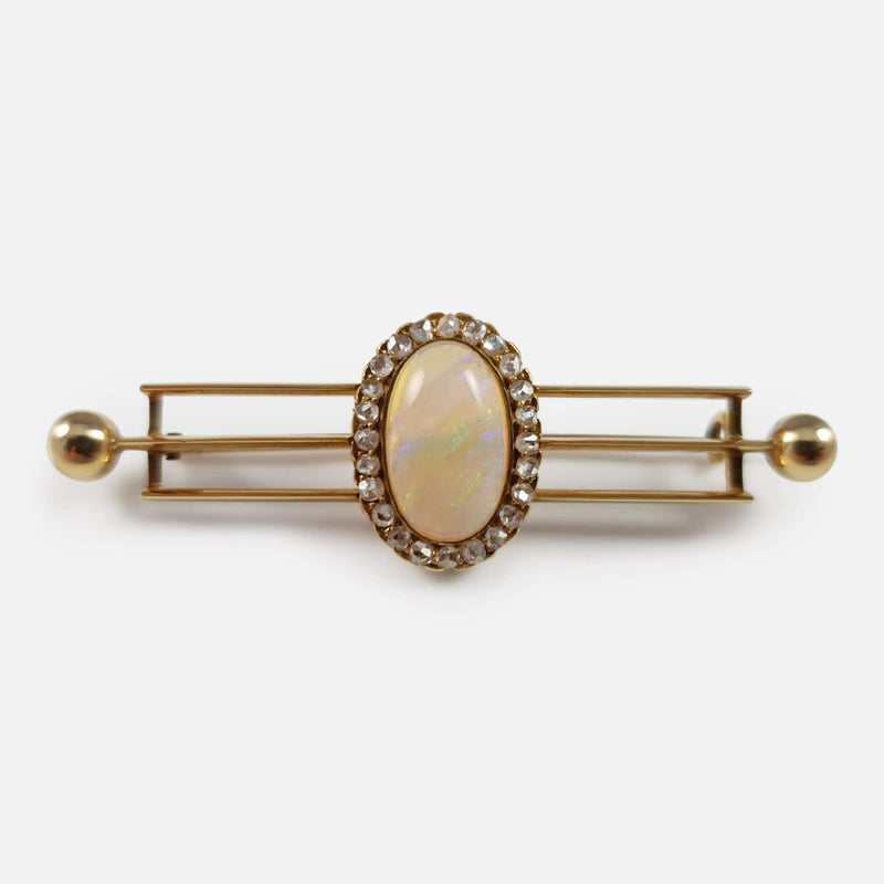the 14ct gold opal and diamond bar brooch viewed from the front