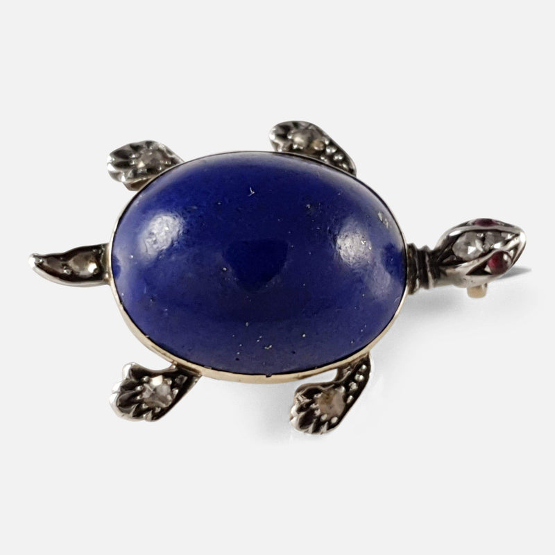 the lapis lazuli diamond and ruby turtle brooch viewed as it would appear when worn