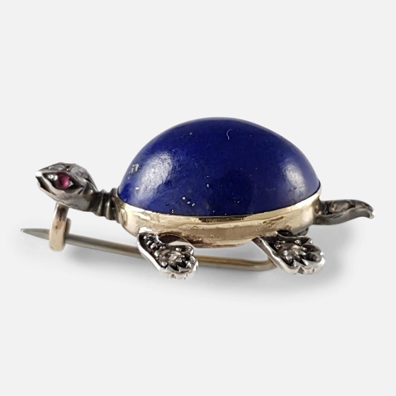 a side on view of the turtle brooch