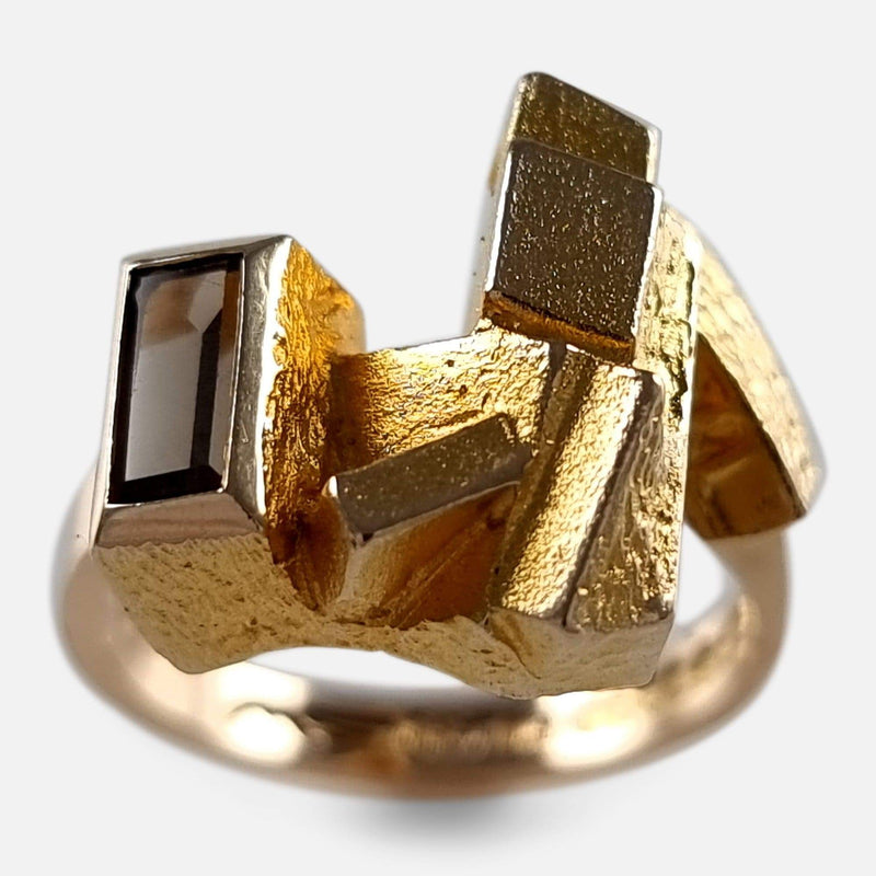 the gold ring viewed from a slightly raised position