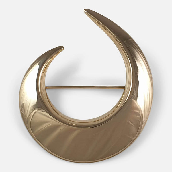 the Hans Hansen 14ct yellow gold crescent brooch viewed from the front