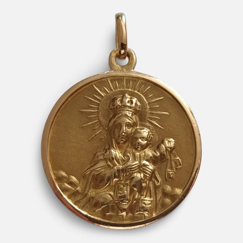 the 14ct yellow gold religious pendant depicting the Virgin Mary