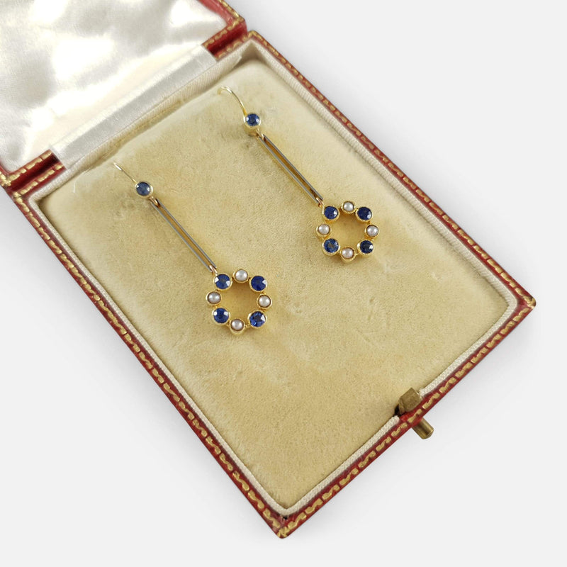 a view of the earrings in the case