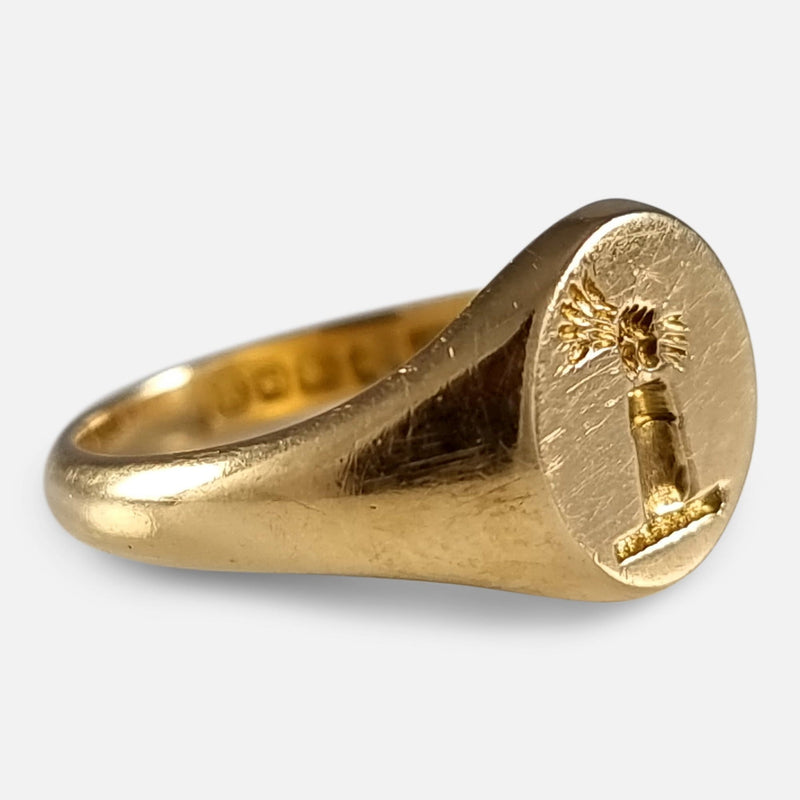 the gold ring viewed from the left side at a slight angle