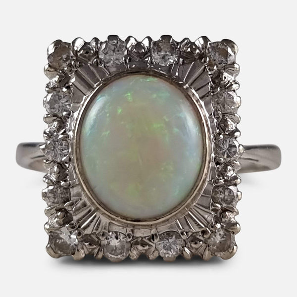 the 18ct white gold opal and diamond cluster ring viewed from the front