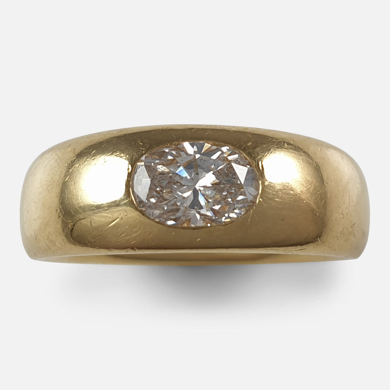 a birds eye view of the 18ct yellow gold and oval diamond ring