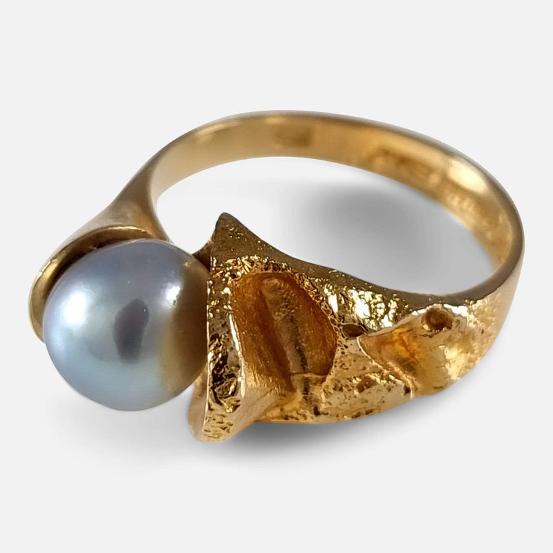 the gold ring viewed from the right side at a slight angle