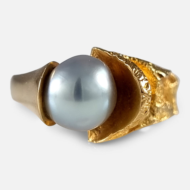 The Lapponia 18ct yellow gold and pearl ring designed by Bjorn Weckstrom, viewed from the front