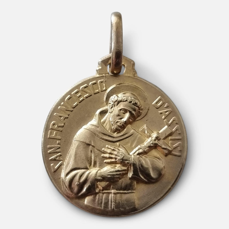 the 18ct yellow gold Francis of Assisi pendant, viewed from the front