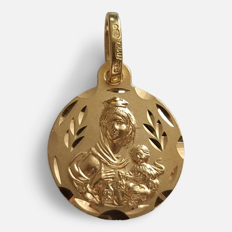 the 18ct yellow gold religious pendant depiction in relief of the Virgin Mary with Baby Jesus
